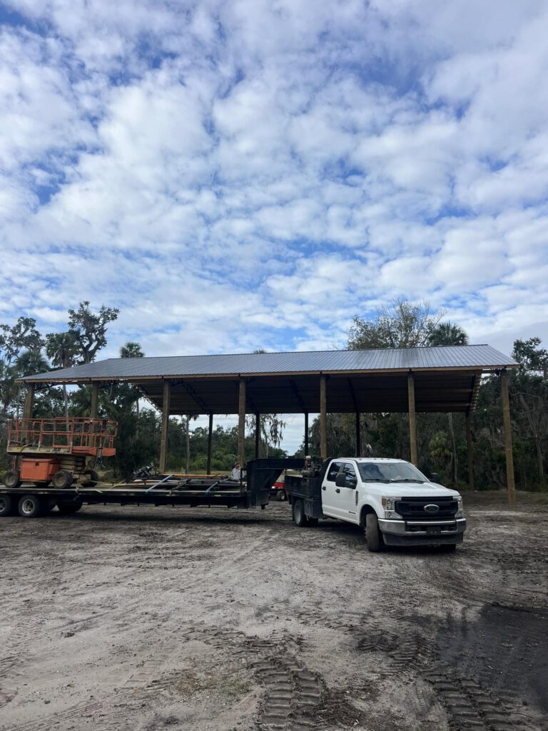 Work truck under pole barn